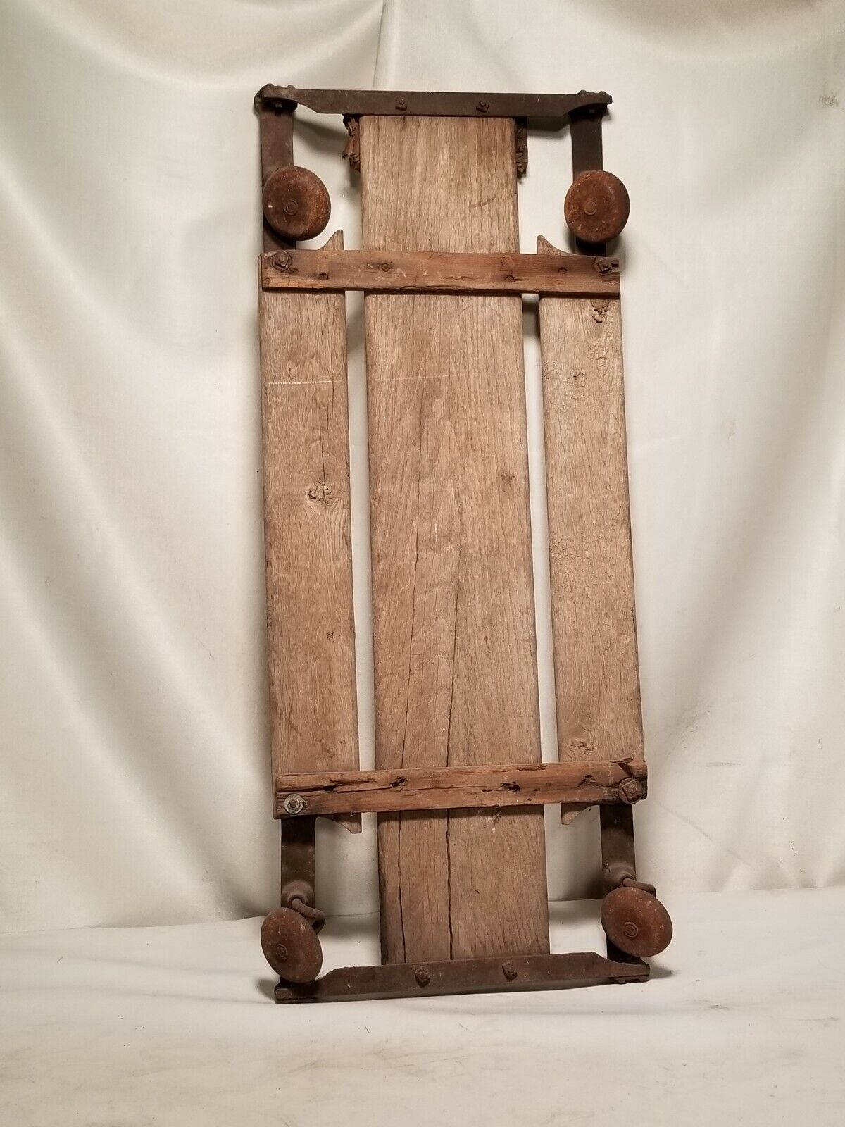Antique mechanics creeper, wood, iron, 36" by 15"