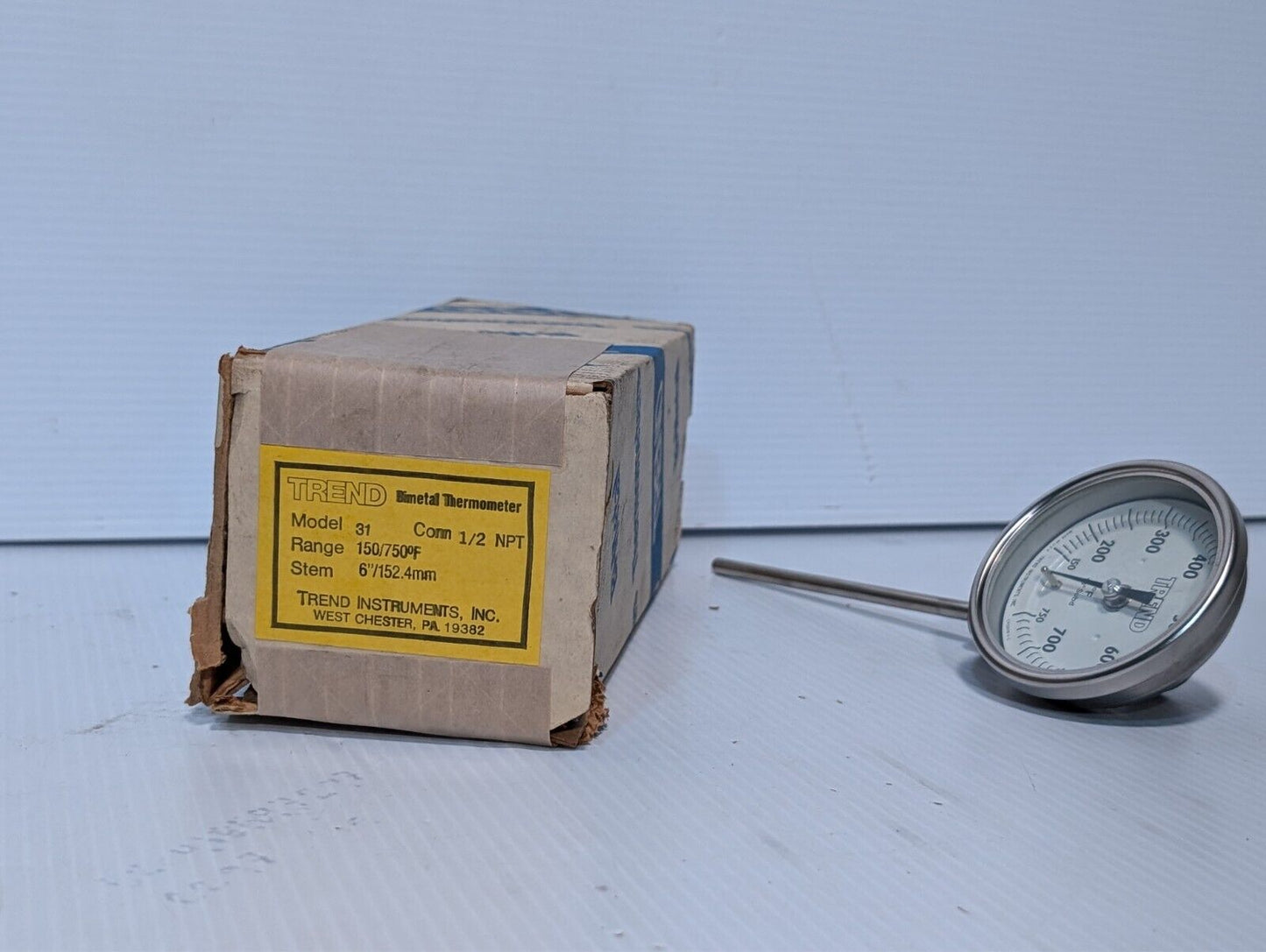 Trend 31 bimetal thermometer, 150-750 deg F, 6 inch stem, 1/2 NPT conn