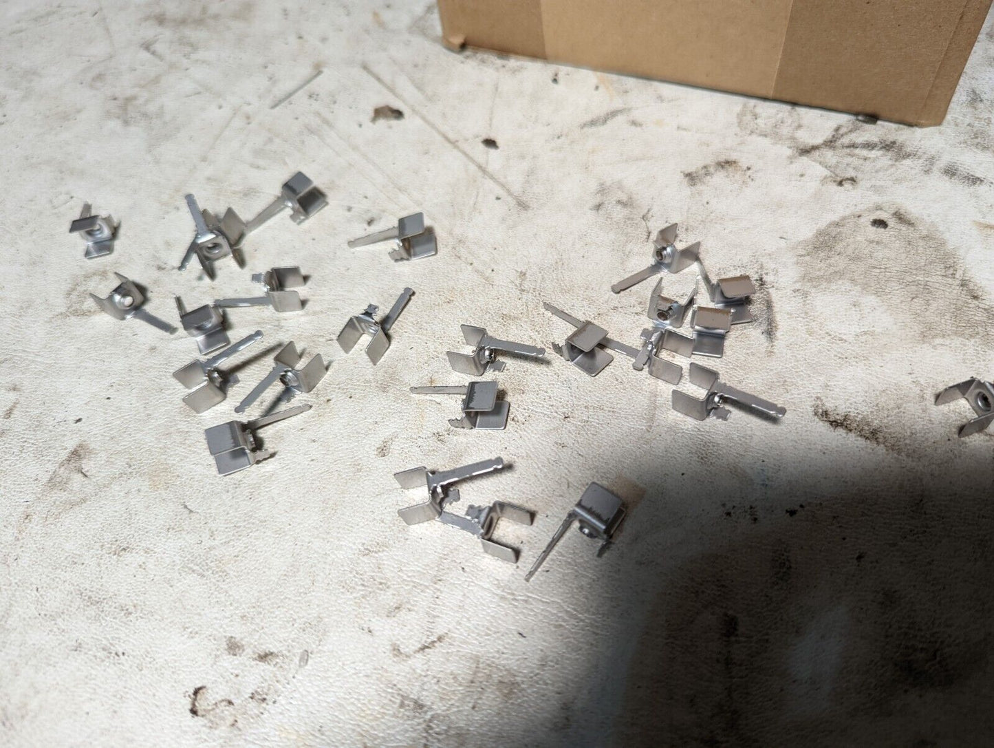 ~12,000 System Sensor T17-179-00 parts, stainless steel 810, brackets, clips