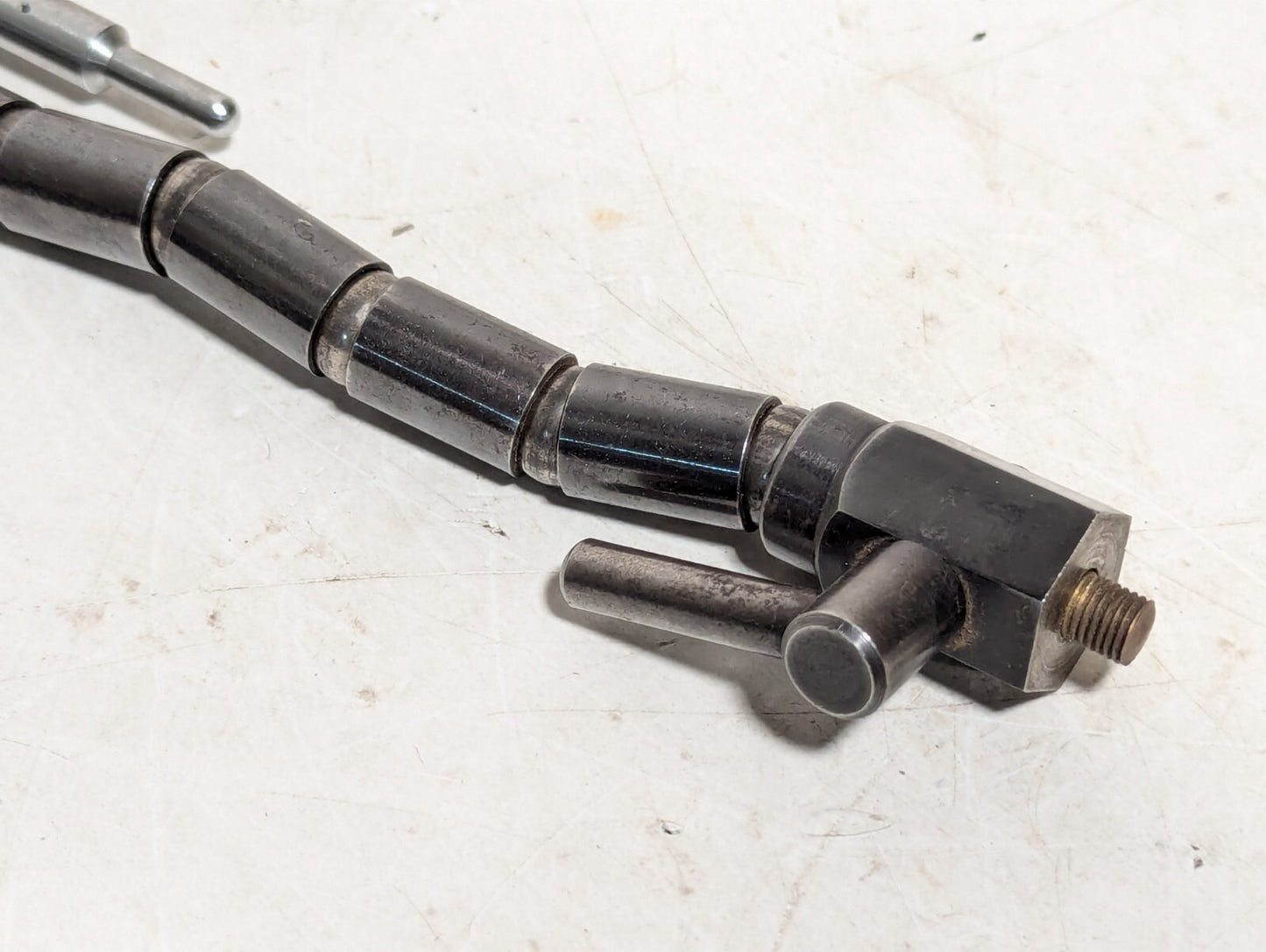 Vintage articulating arm, 6 joints, 5.5 inches long, with mounts as shown
