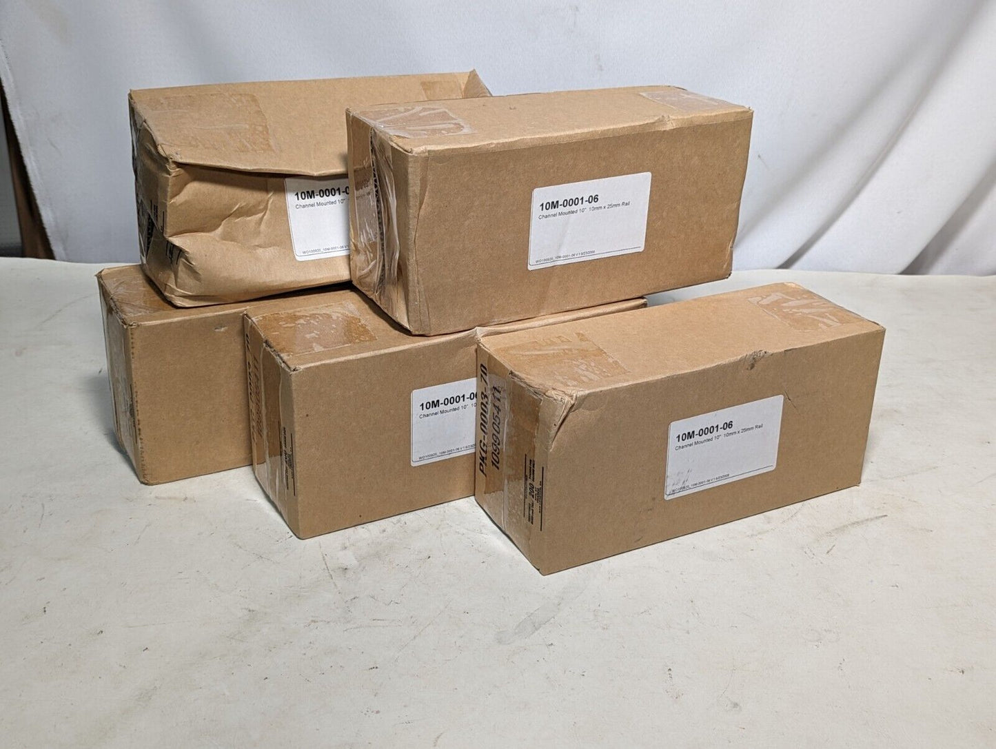 GCX? 10M-0001-06 channel mounted 10" 10 mm x 25 mm rail
