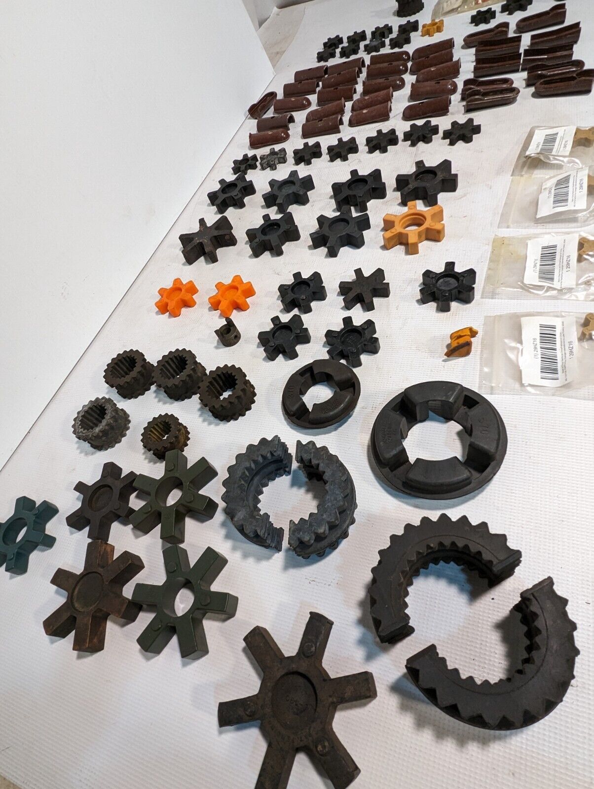 Lot of rubber and plastic couplers as pictured: Lovejoy, Magnaloy, Wood's