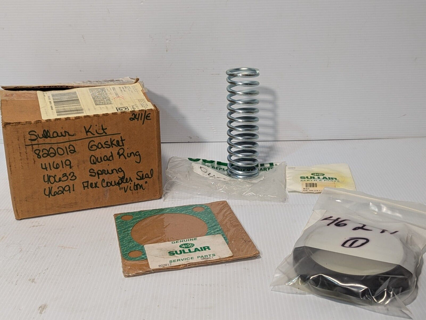 Sullair kit: 822012 gasket, 41619 quad ring, 40633 spring, 46291 flex coupler se