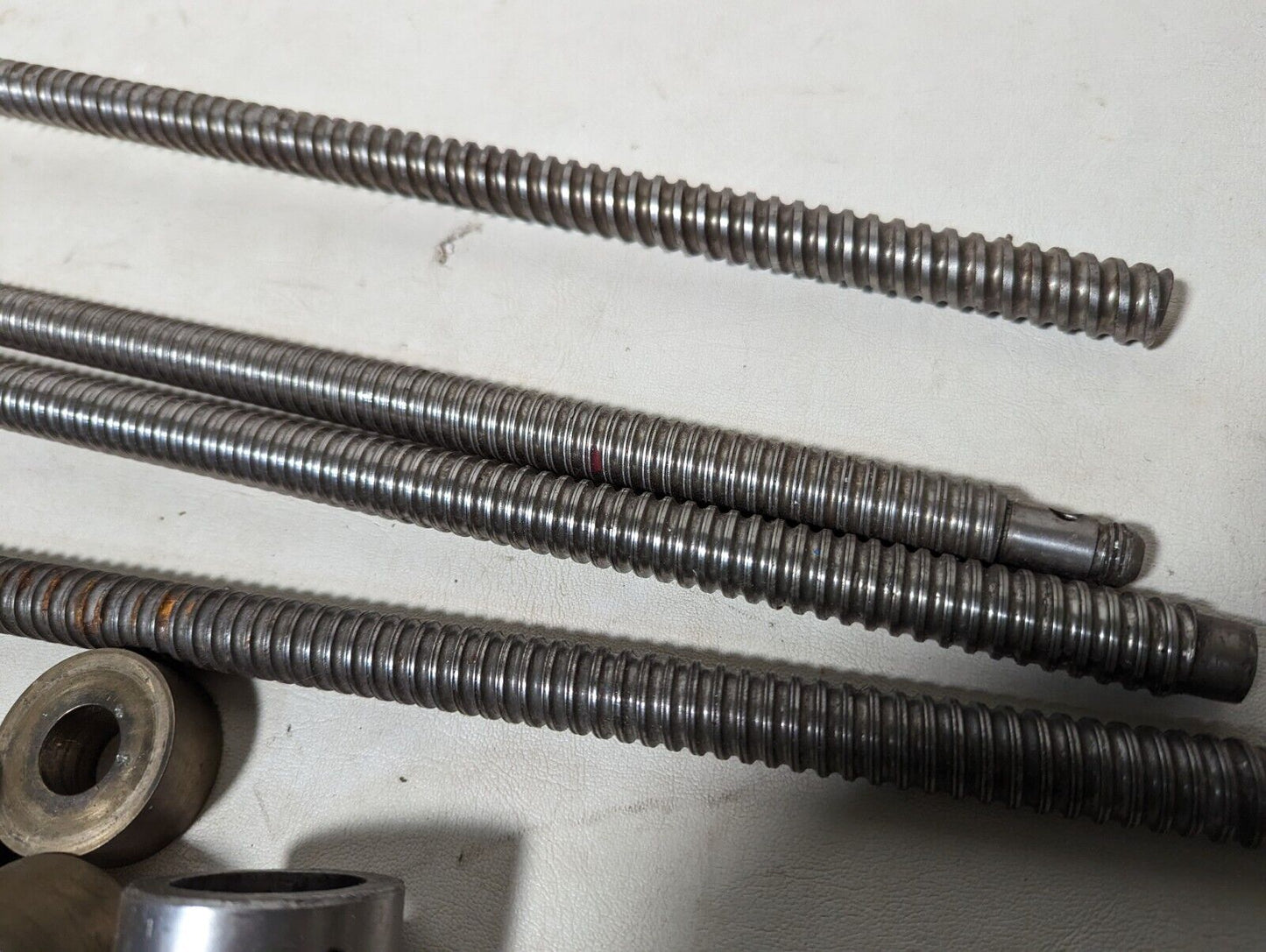 Lot of 4 feed screws, 3x 32 inches, 1x 36 inches long, plus some extras