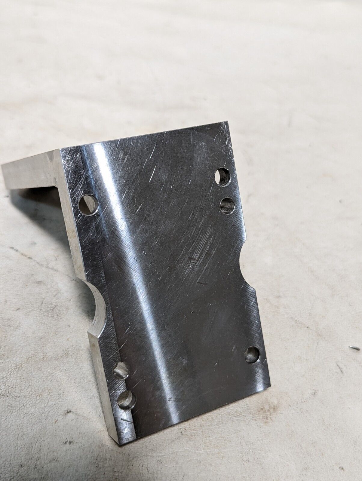 Aluminum right angle bracket, 5 in long, 4 in deep, 2.5 in wide, 0.5 in thick