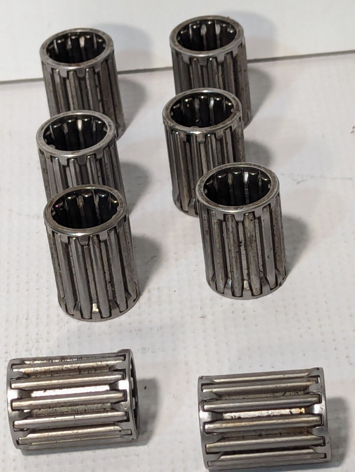Lot of 8 Unbranded Needle Roller Bearings, 1-3/16 inch tall, 5/8 inch ID