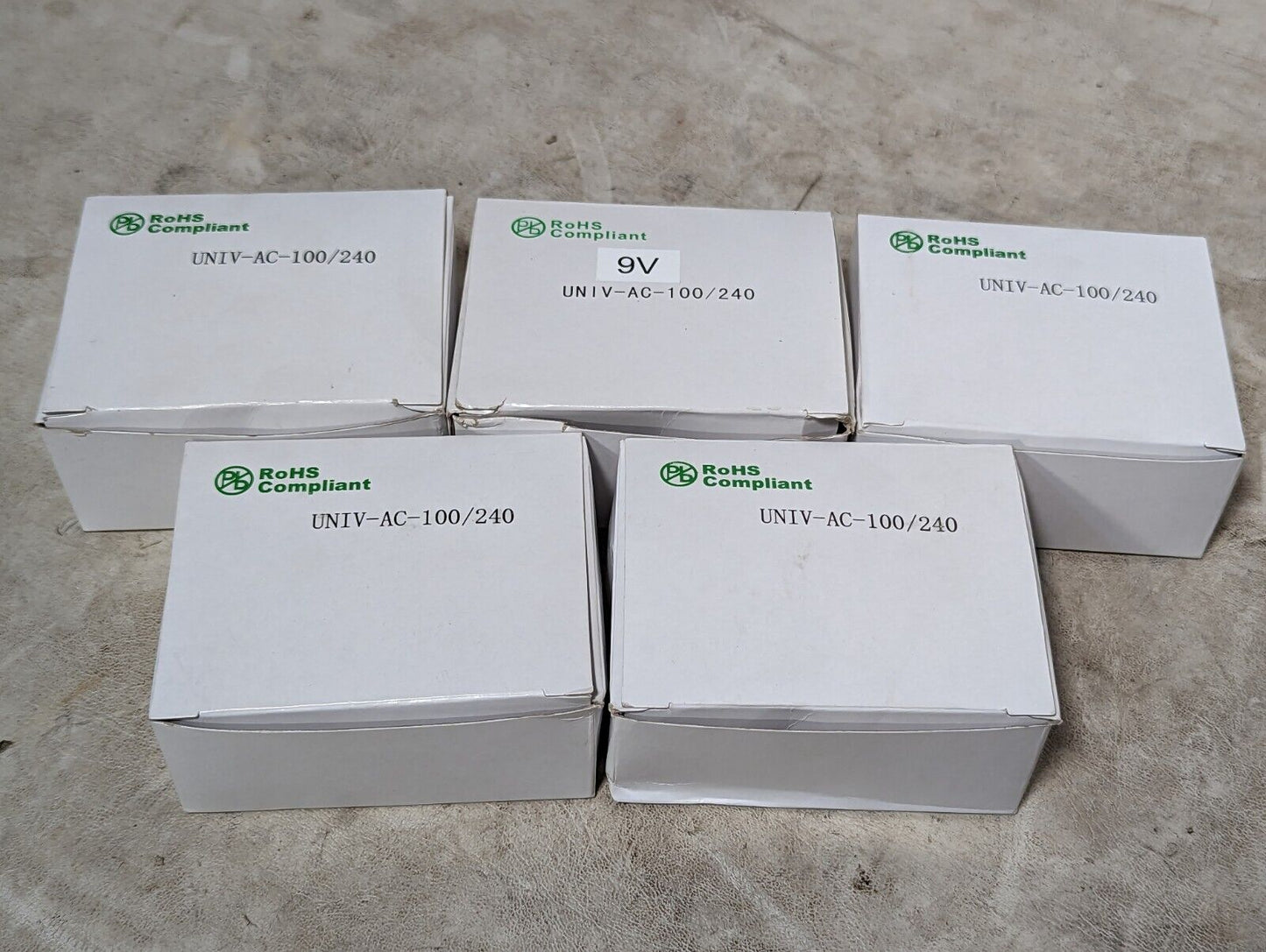 Lot of 4 full, 1 incomplete click CPS012090100* transformers, 100-240VAC to 9VDC