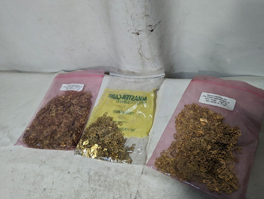 Spiros Industries 310001-0000-00 brass clips (two bags) and another unmarked bag