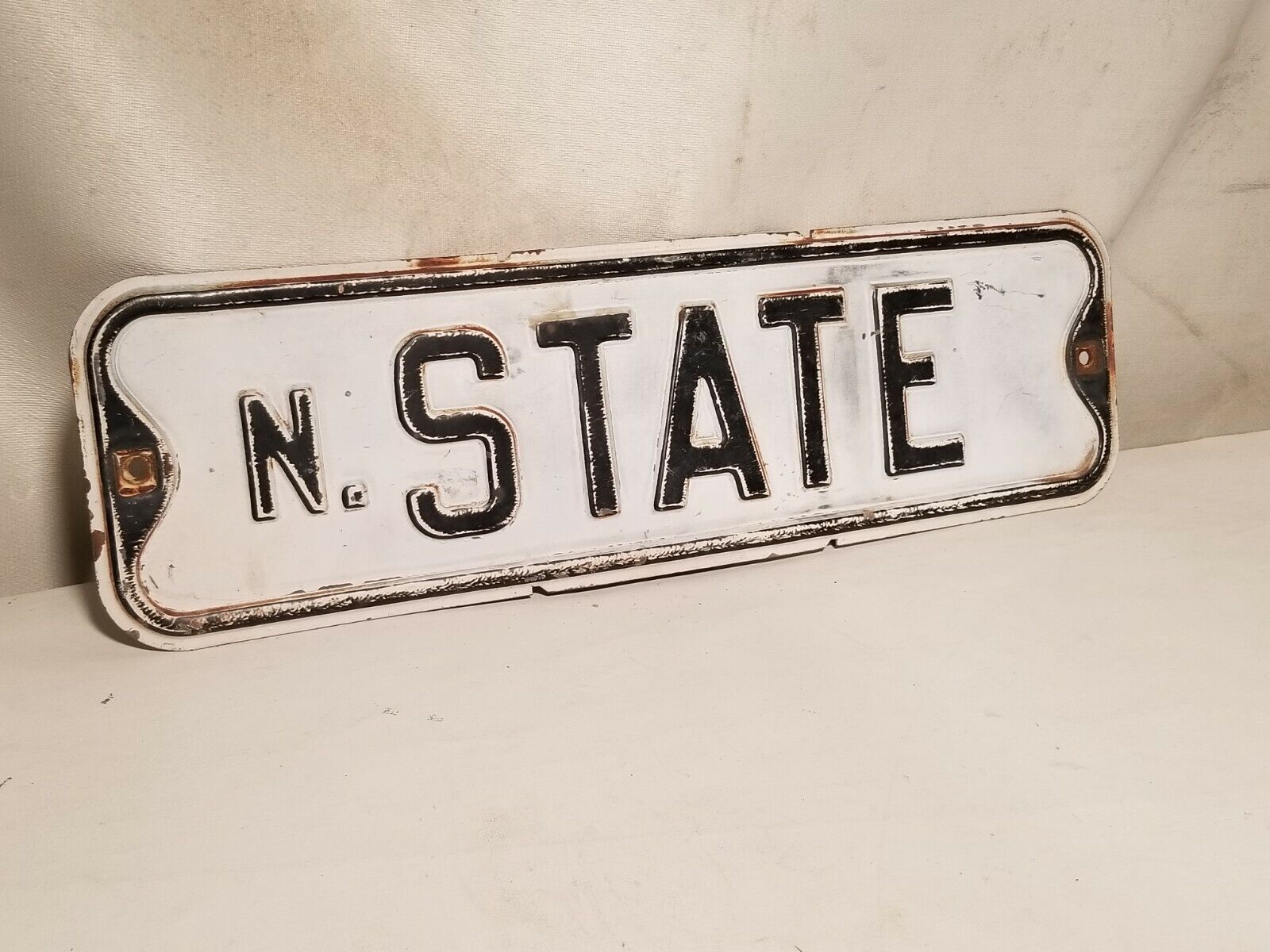 State Street Sign, North State, black and white, some rust, embossed