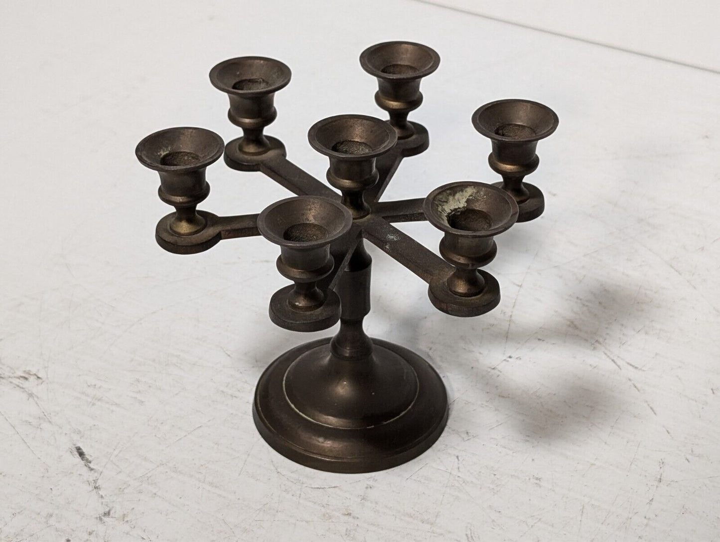 Vintage brass candelabra with seven candleholders, 4.5" tall x 5.5" in diameter