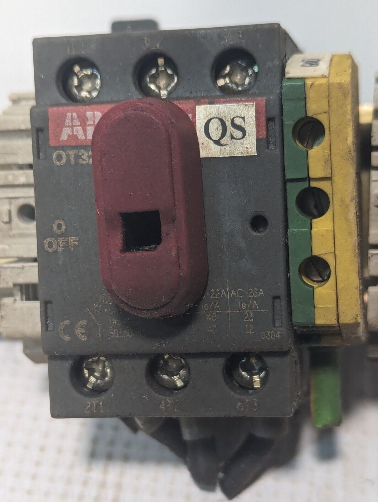 ABB OT32E3 disconnect switch on DIN rail as pictured