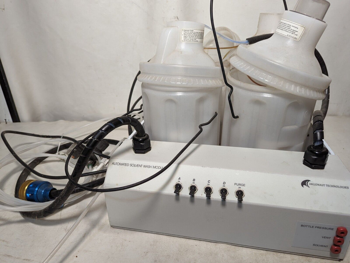 Argonaut Technologies Quest 210 ASW system, automated solvent wash module