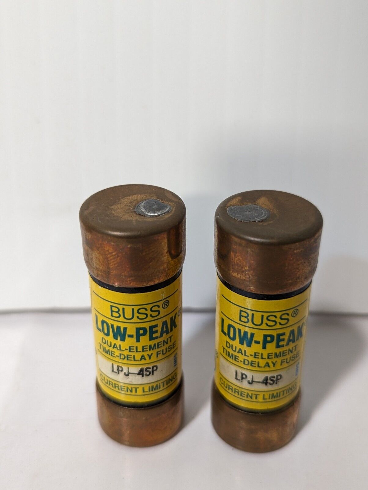 Lot of 2 Bussmann LPJ-4SP, 2 Bussmann LPJ-5SP fuses as pictured, low peak