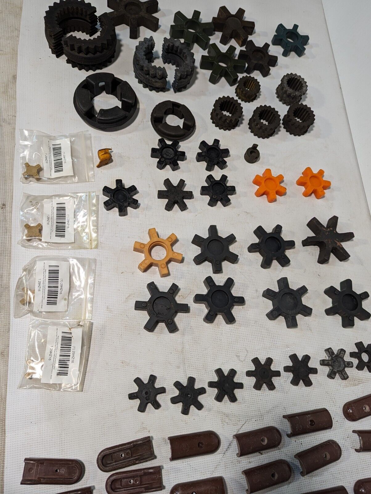 Lot of rubber and plastic couplers as pictured: Lovejoy, Magnaloy, Wood's
