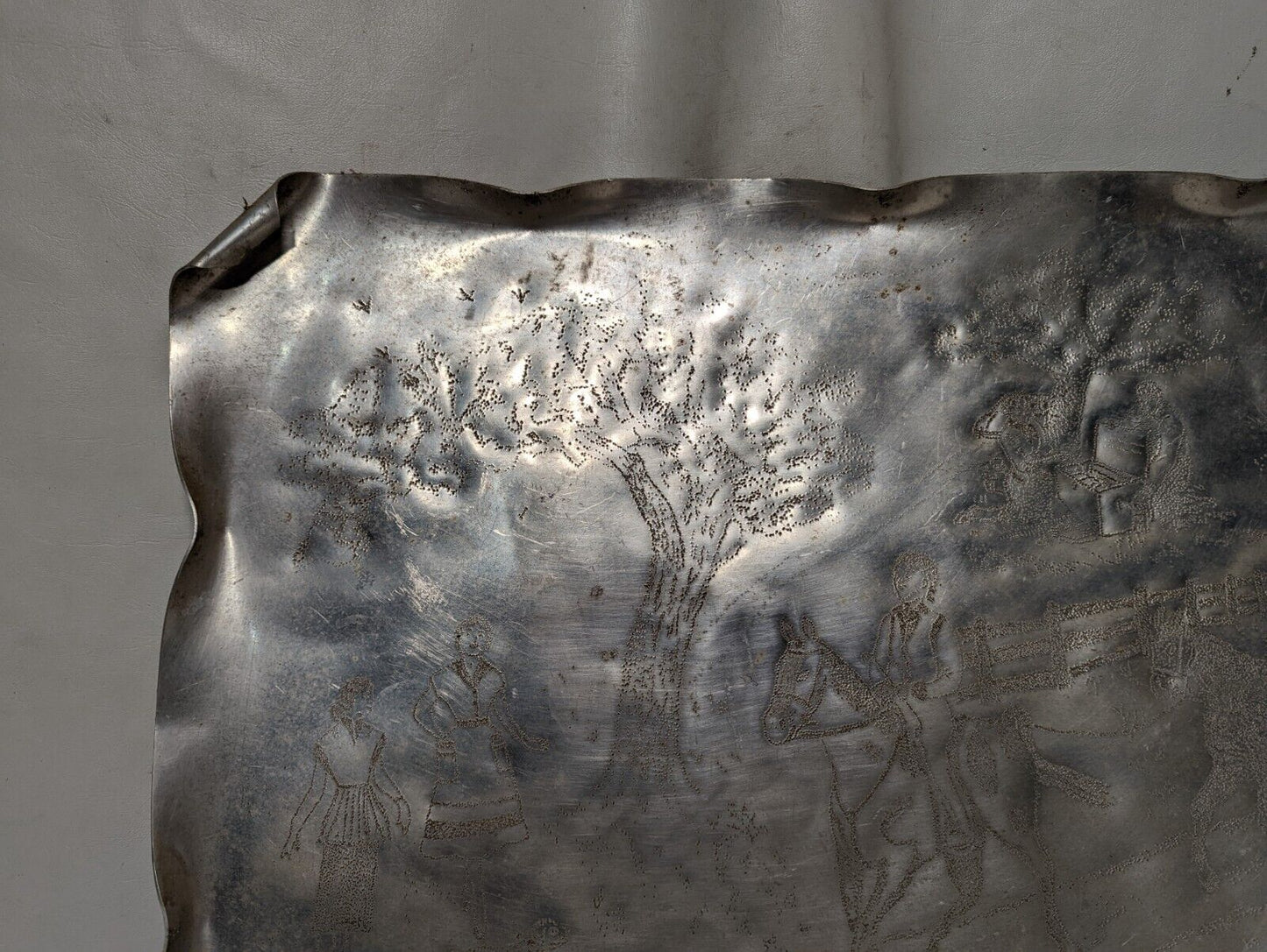 Handmade punched aluminum serving tray from 1951, horseback riding