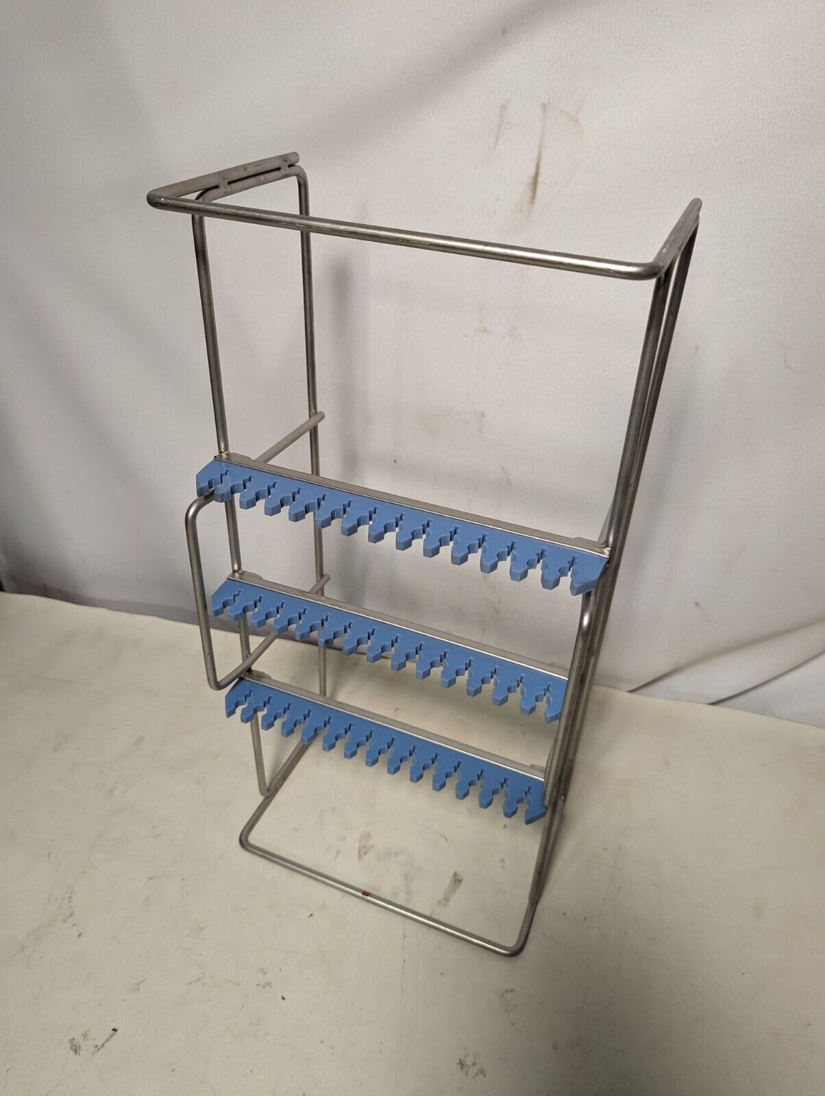 Wire and tubing organizer from medical facility, 19 in x 9.5 in x 6 in