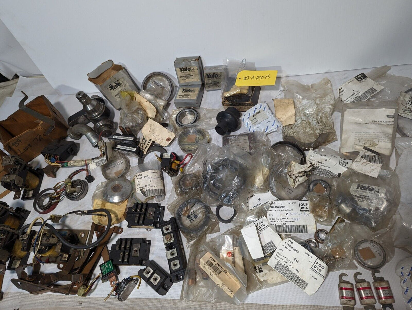 Large lot of Nissan forklift parts as pictured