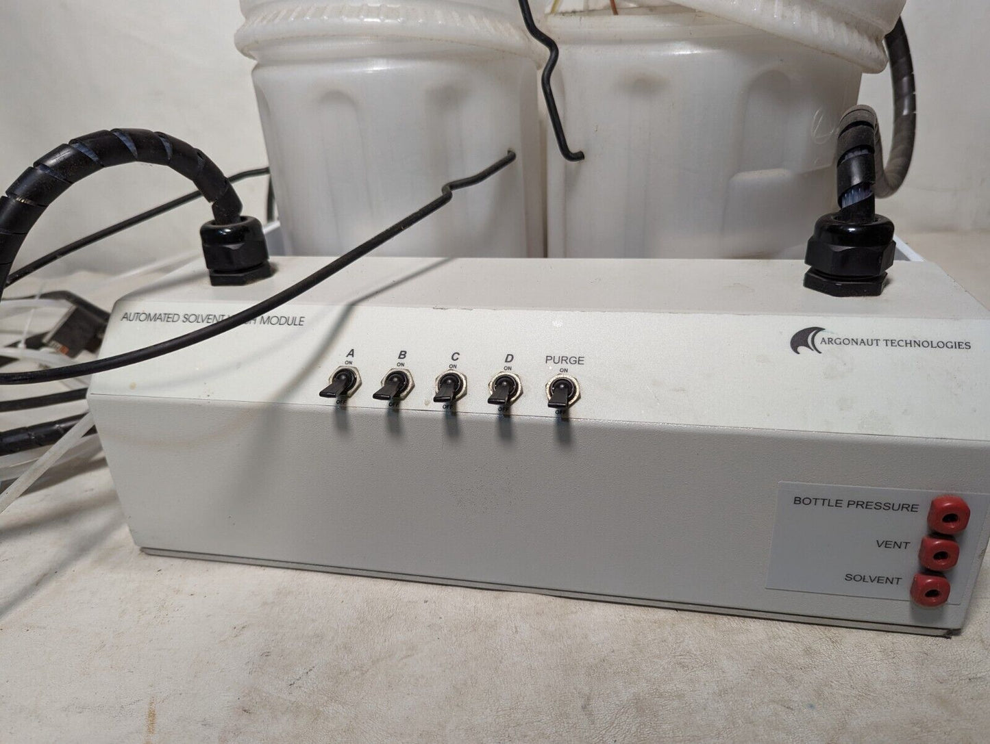 Argonaut Technologies Quest 210 ASW system, automated solvent wash module