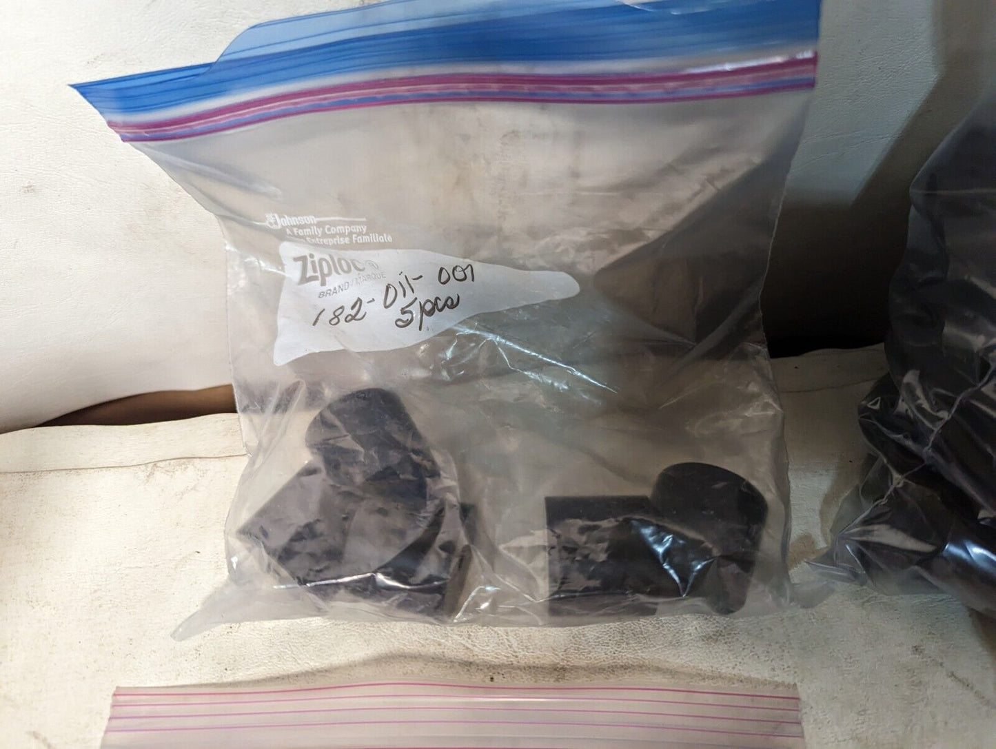 4.5+ pounds of black Delrin hardware as pictured