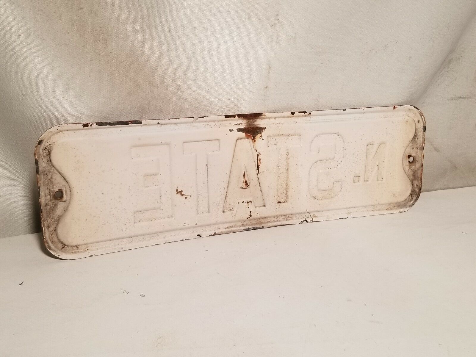 State Street Sign, North State, black and white, some rust, embossed