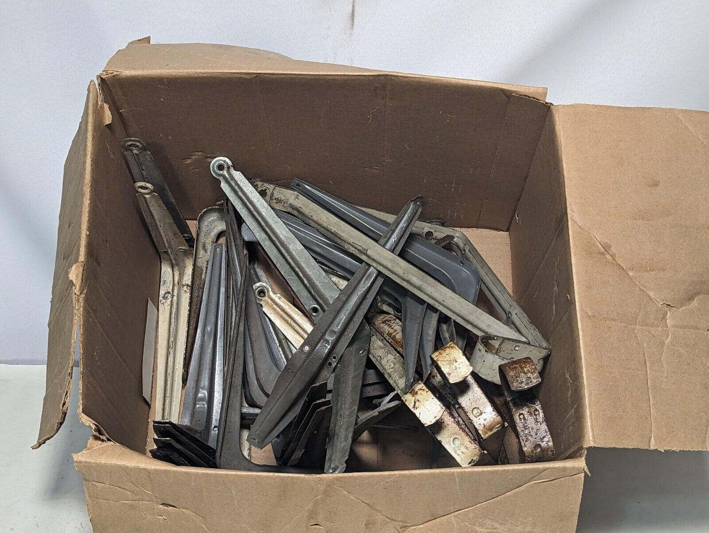 Lot of assorted vintage angle brackets, nice patina