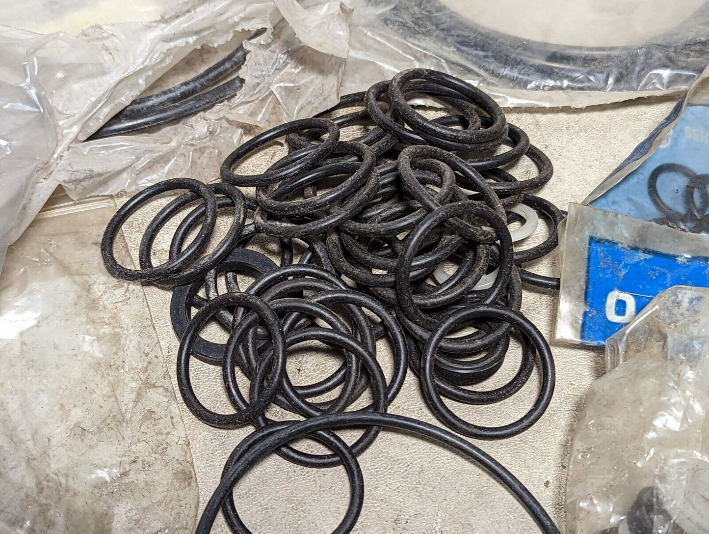Lot of rubber, Buna N O-rings, rubber straps, and a rubbery cylinder...