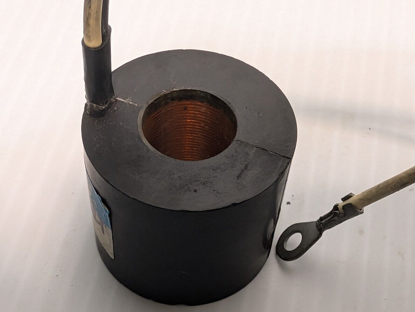 Vickers 389751 solenoid coil, 24V, and another presumably the same, but unmarked