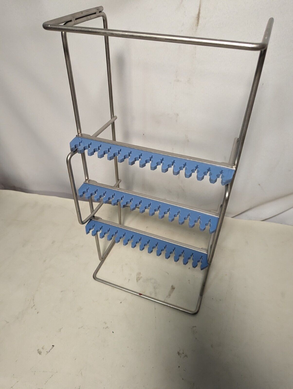 Wire and tubing organizer from medical facility, 19 in x 9.5 in x 6 in