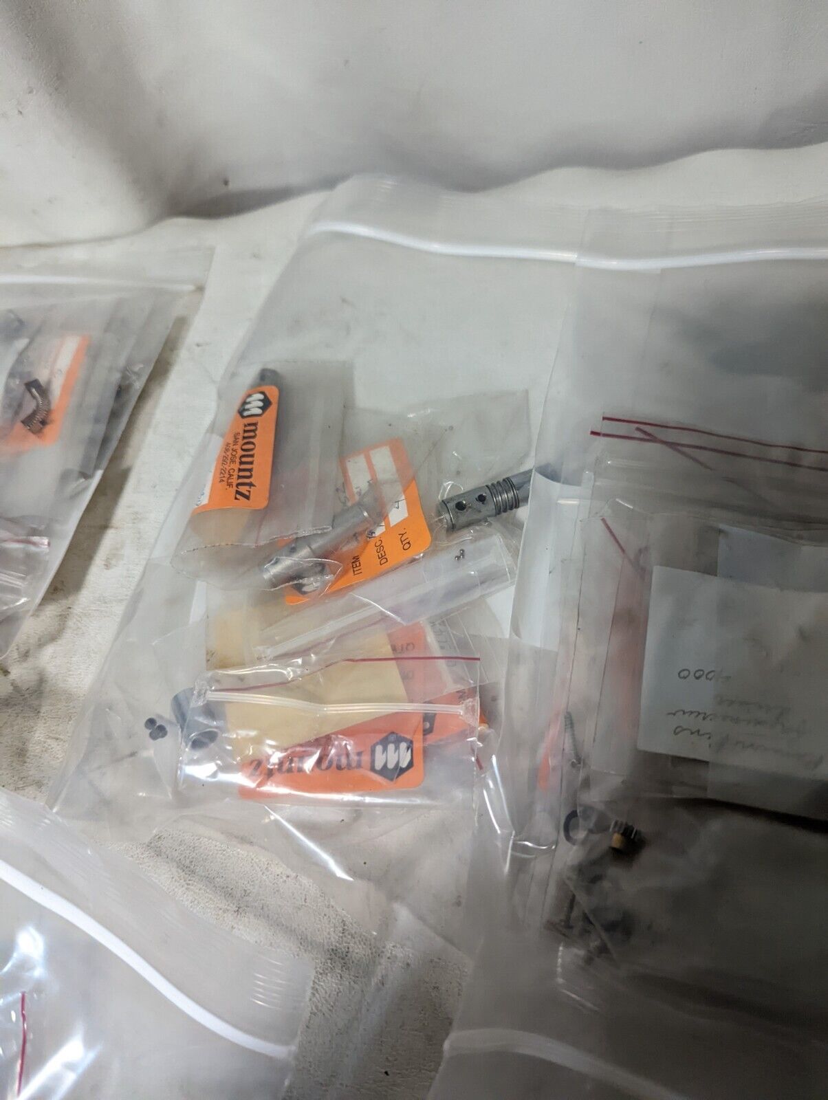 Large lot of parts for Mountz automatic screwdriver