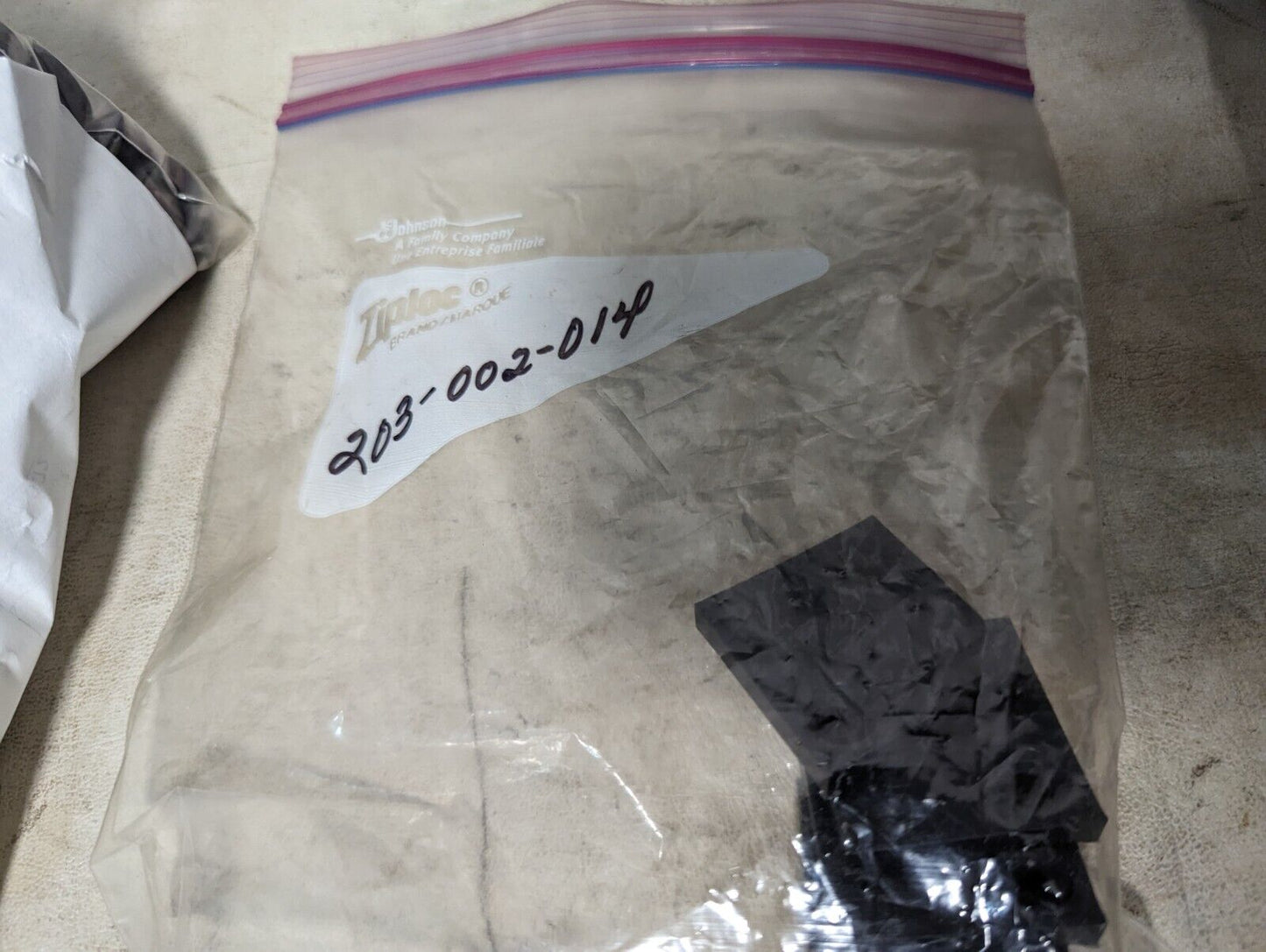 4.5+ pounds of black Delrin hardware as pictured