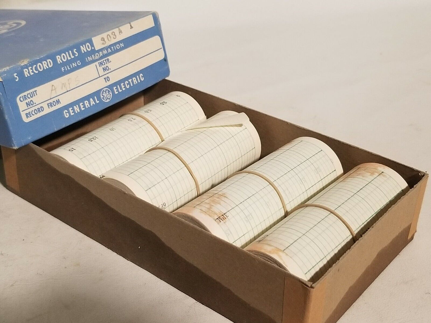 2 boxes of GE record rolls V2A71 (volts) and 303A1 (amps), 5 rolls per box
