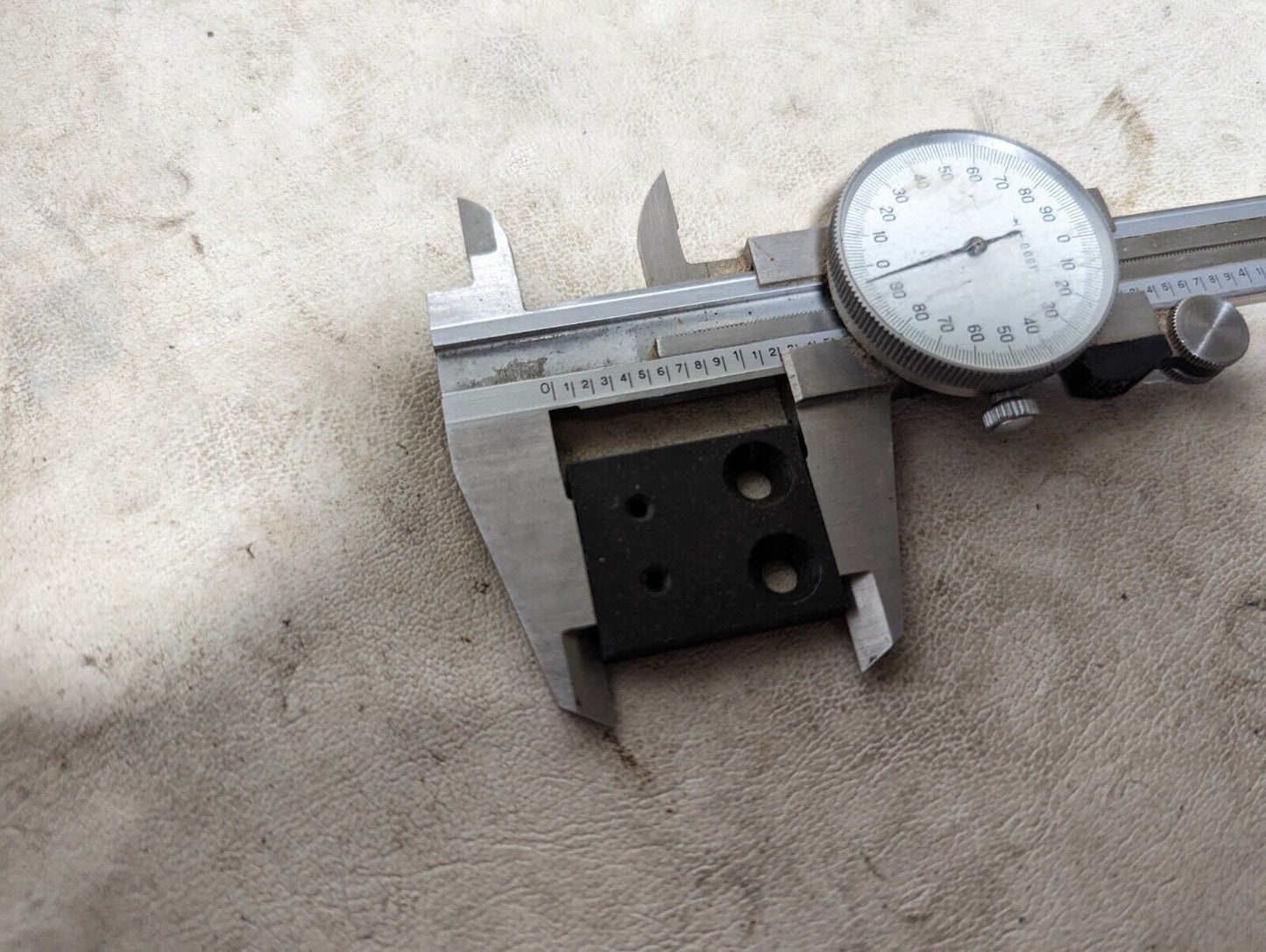 6.5+ pounds of flat metal bracket plates as pictured, 0.19 inches thick...