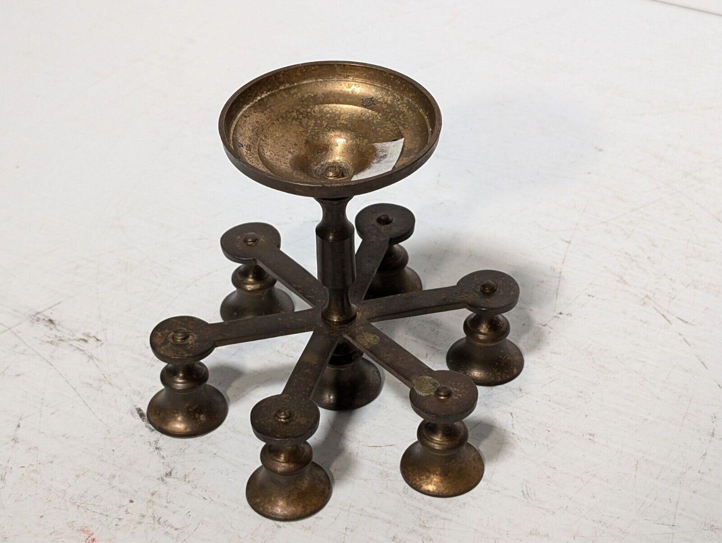 Vintage brass candelabra with seven candleholders, 4.5" tall x 5.5" in diameter