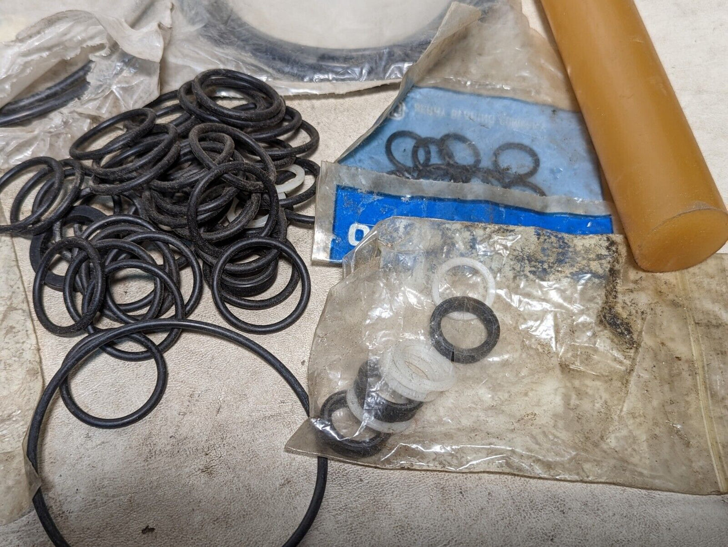 Lot of rubber, Buna N O-rings, rubber straps, and a rubbery cylinder...
