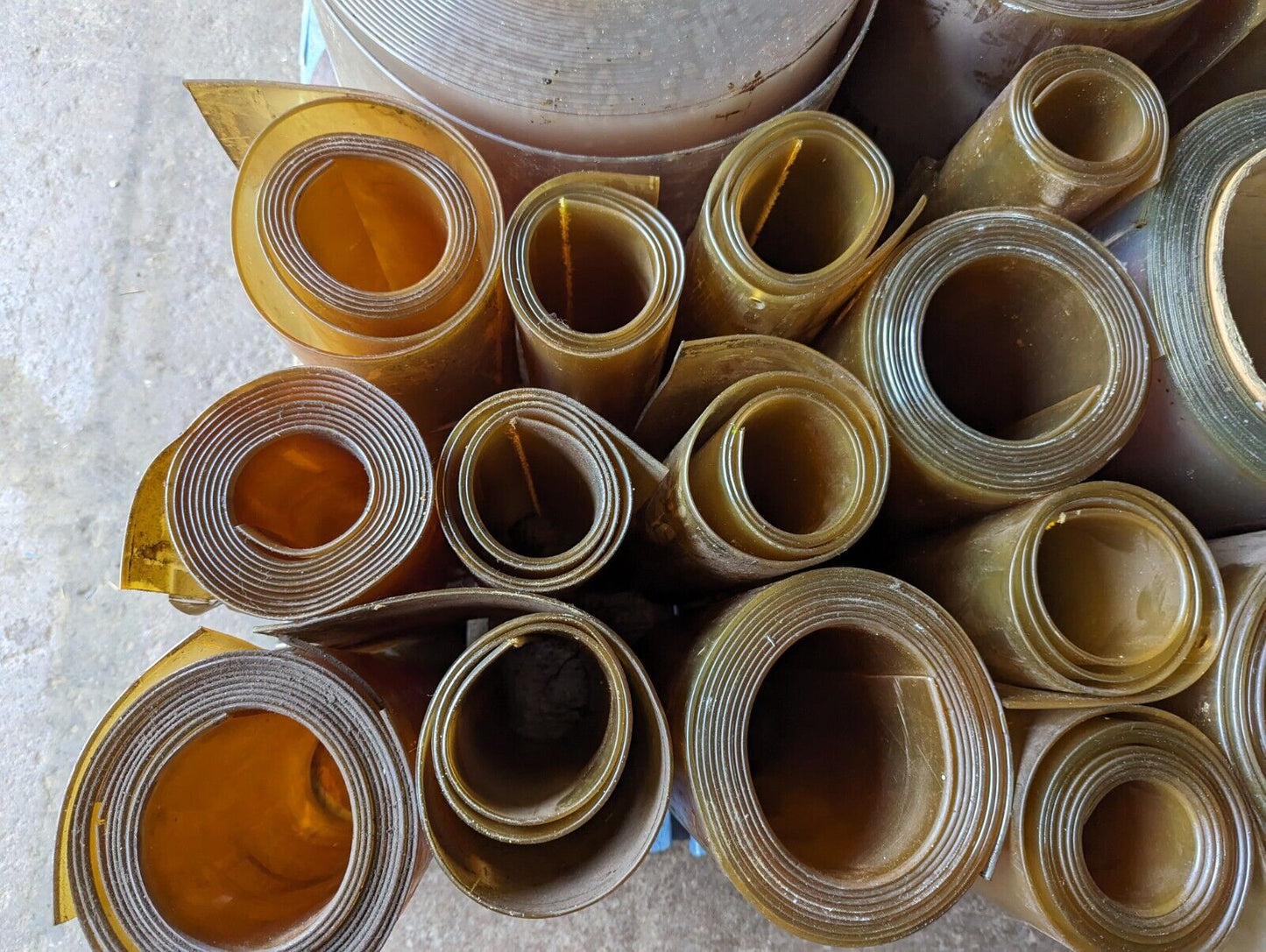 30in x 30in pallet full of 12 in wide plastic/PVC rolls as pictured