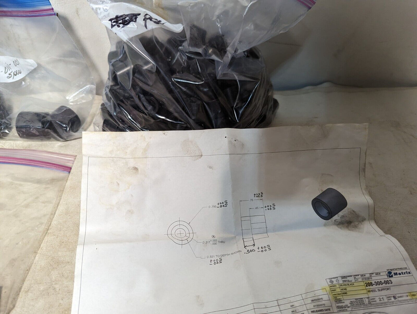 4.5+ pounds of black Delrin hardware as pictured