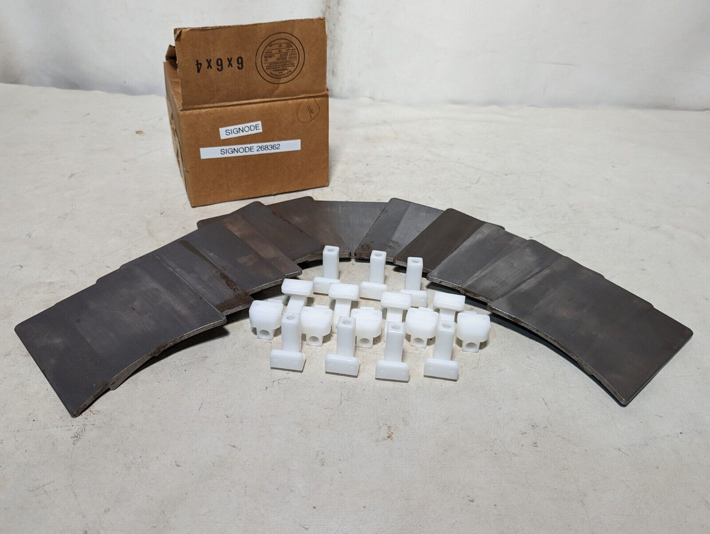 Signode 268362 track clips: twelve 5in by 4.25 in by 3/16 in steel plates