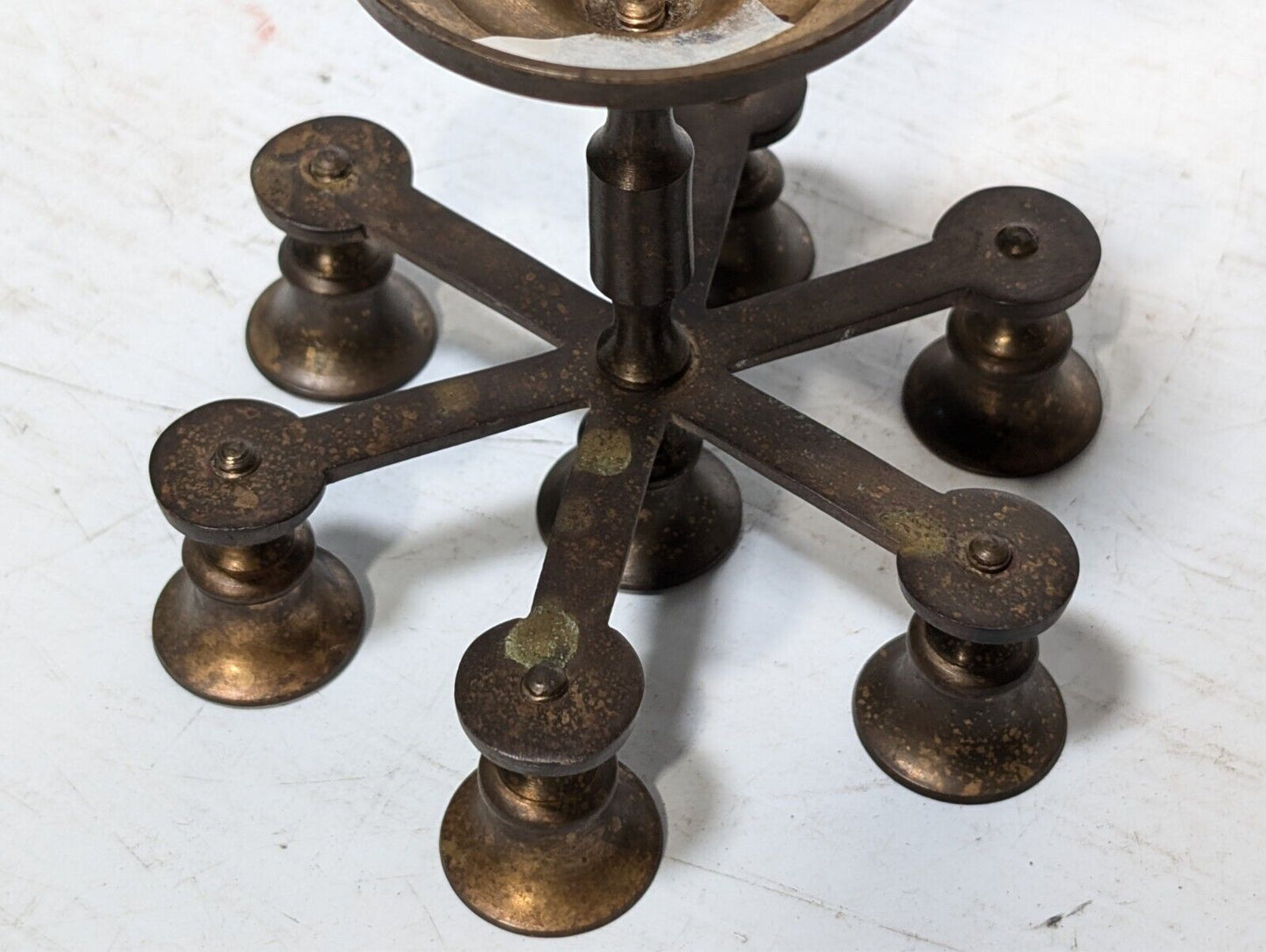 Vintage brass candelabra with seven candleholders, 4.5" tall x 5.5" in diameter