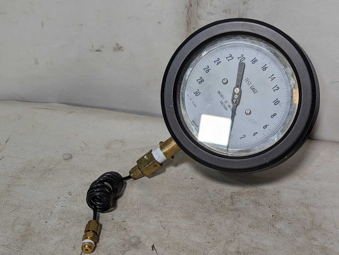 Acragage pressure gauge, 0-30 inches of Mercury vacuum, bronze tube, brass socke