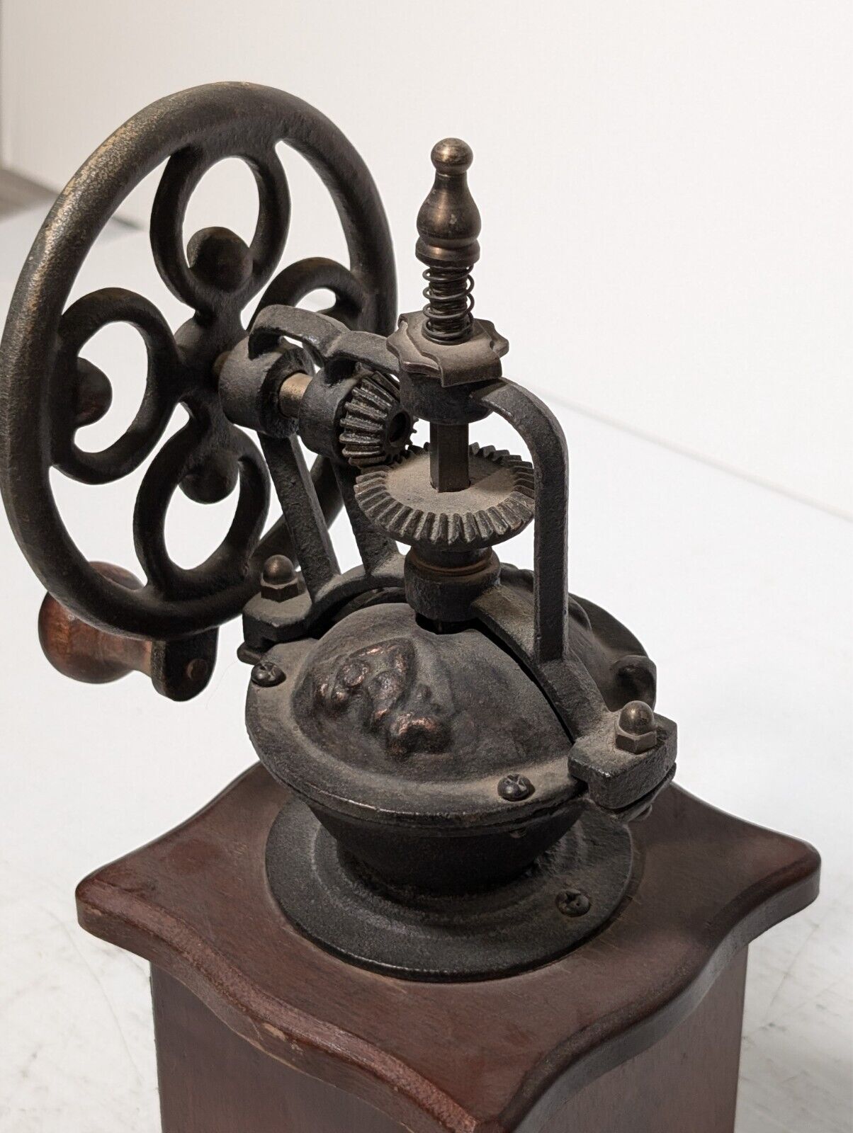 Vintage wood and cast iron manual coffee grinder as pictured with little drawer