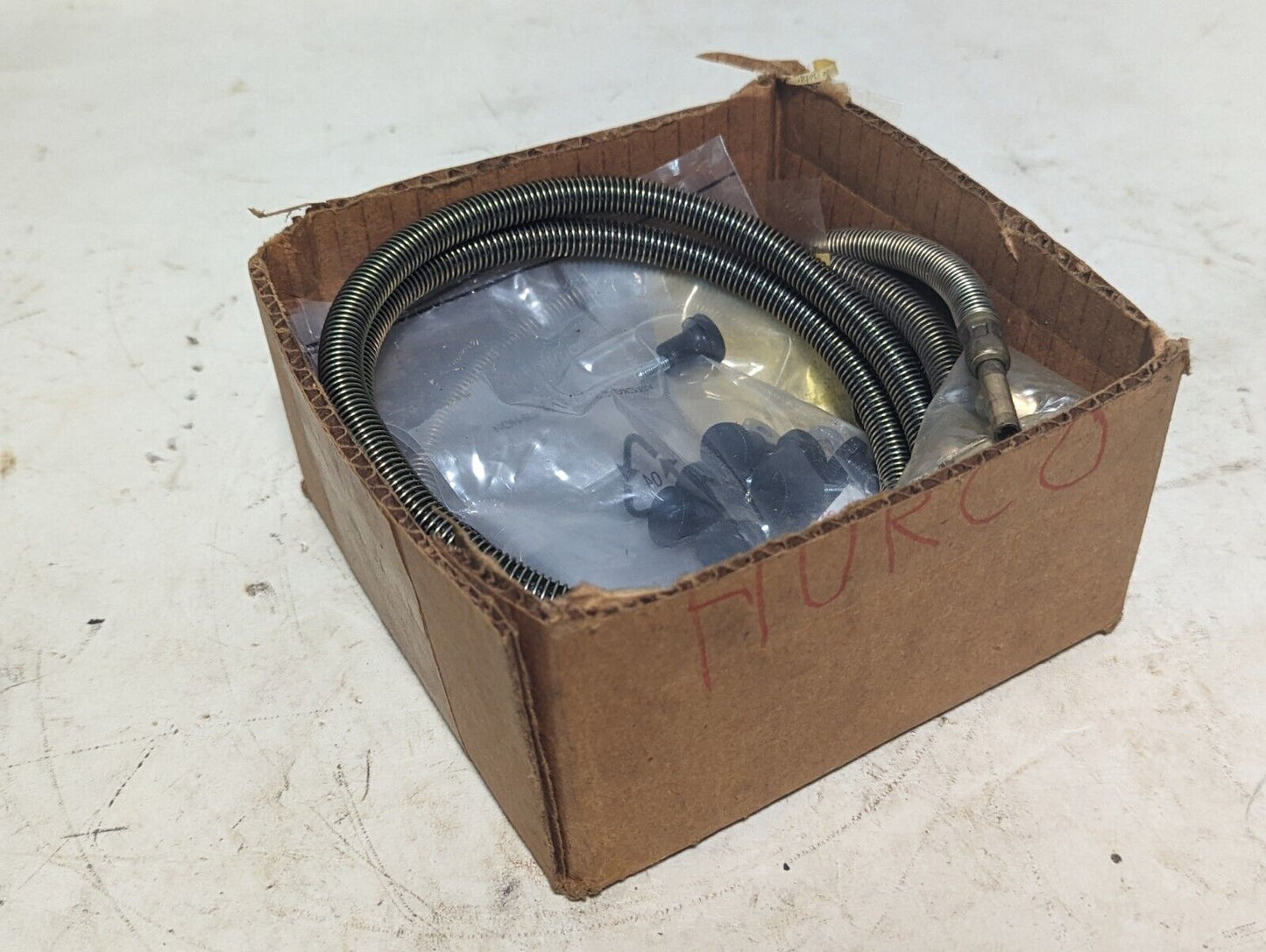 Lot of assorted Showa lubricating parts: two hoses, PB-6M, springs, PD-6M