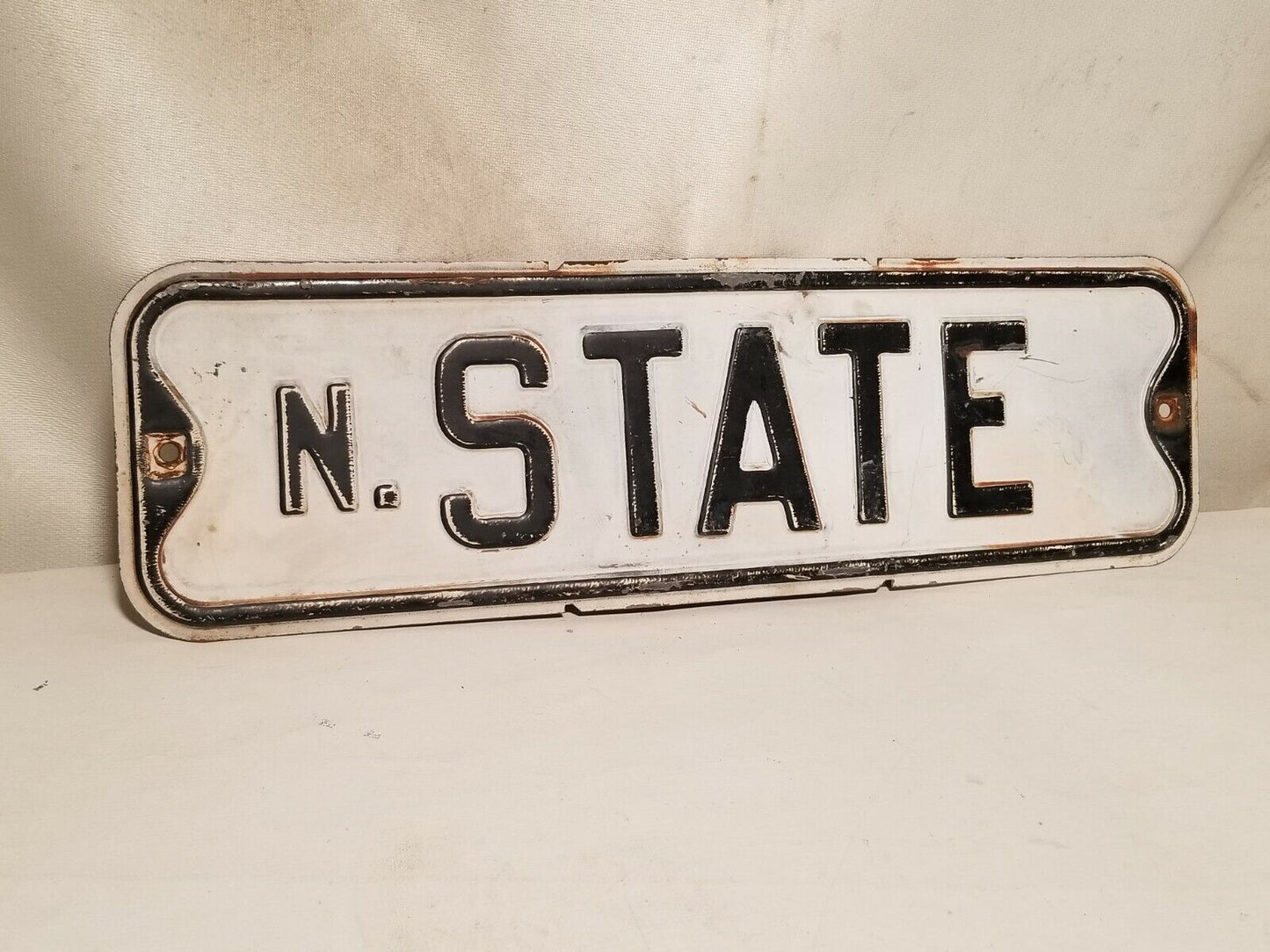 State Street Sign, North State, black and white, some rust, embossed