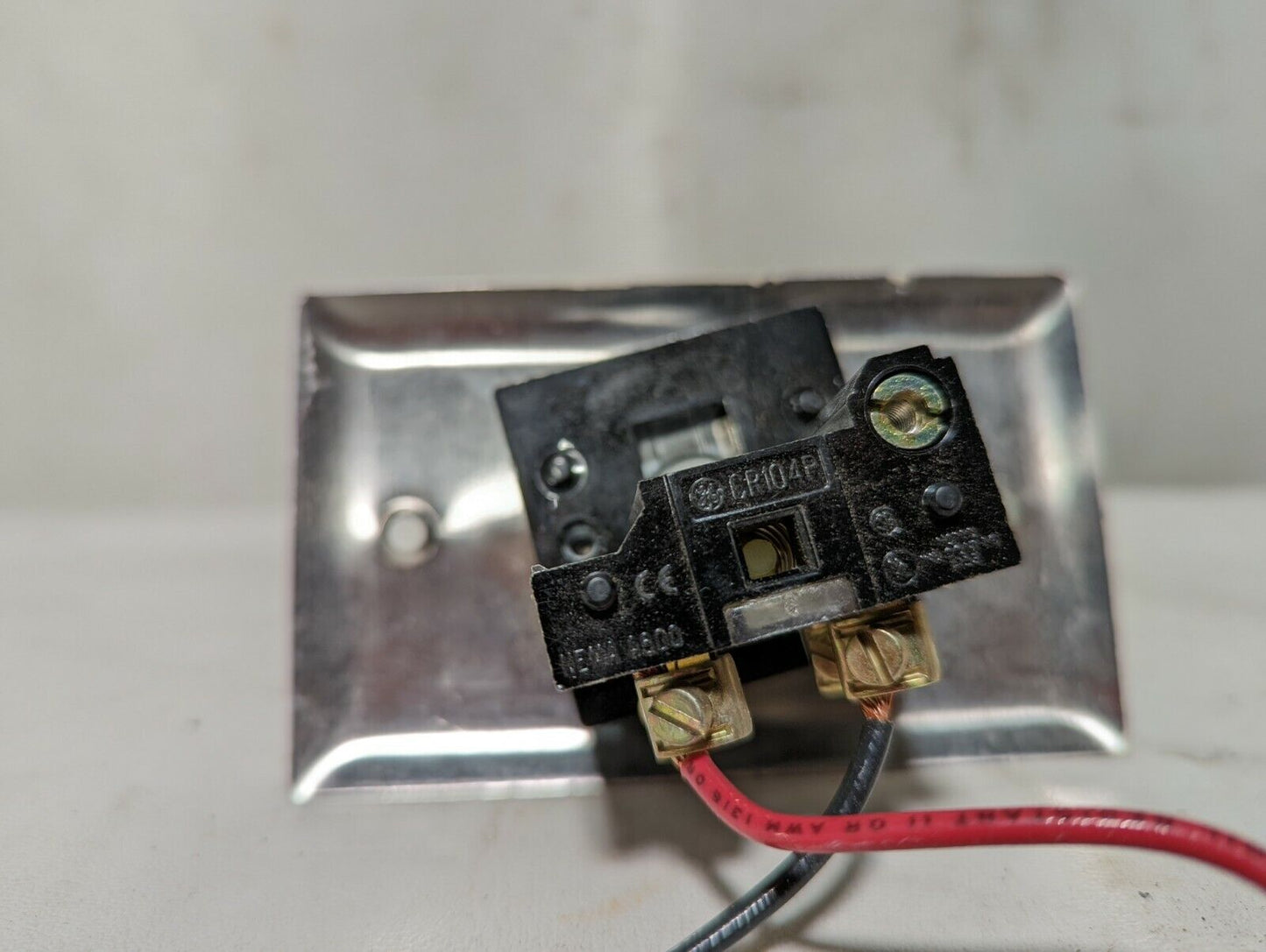 Lot of 2 GE CR104P red pushbutton switches mounted on stainless steel cover plat