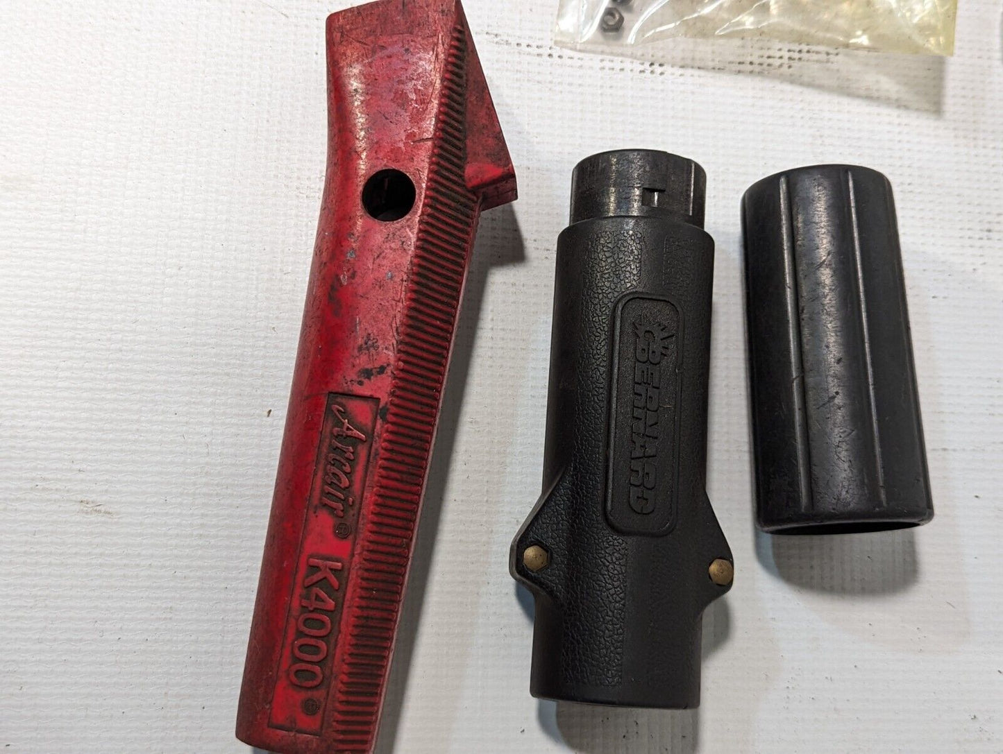 Large lot of Arcair welding parts as pictured: 94103114, 94433118, 94048087....