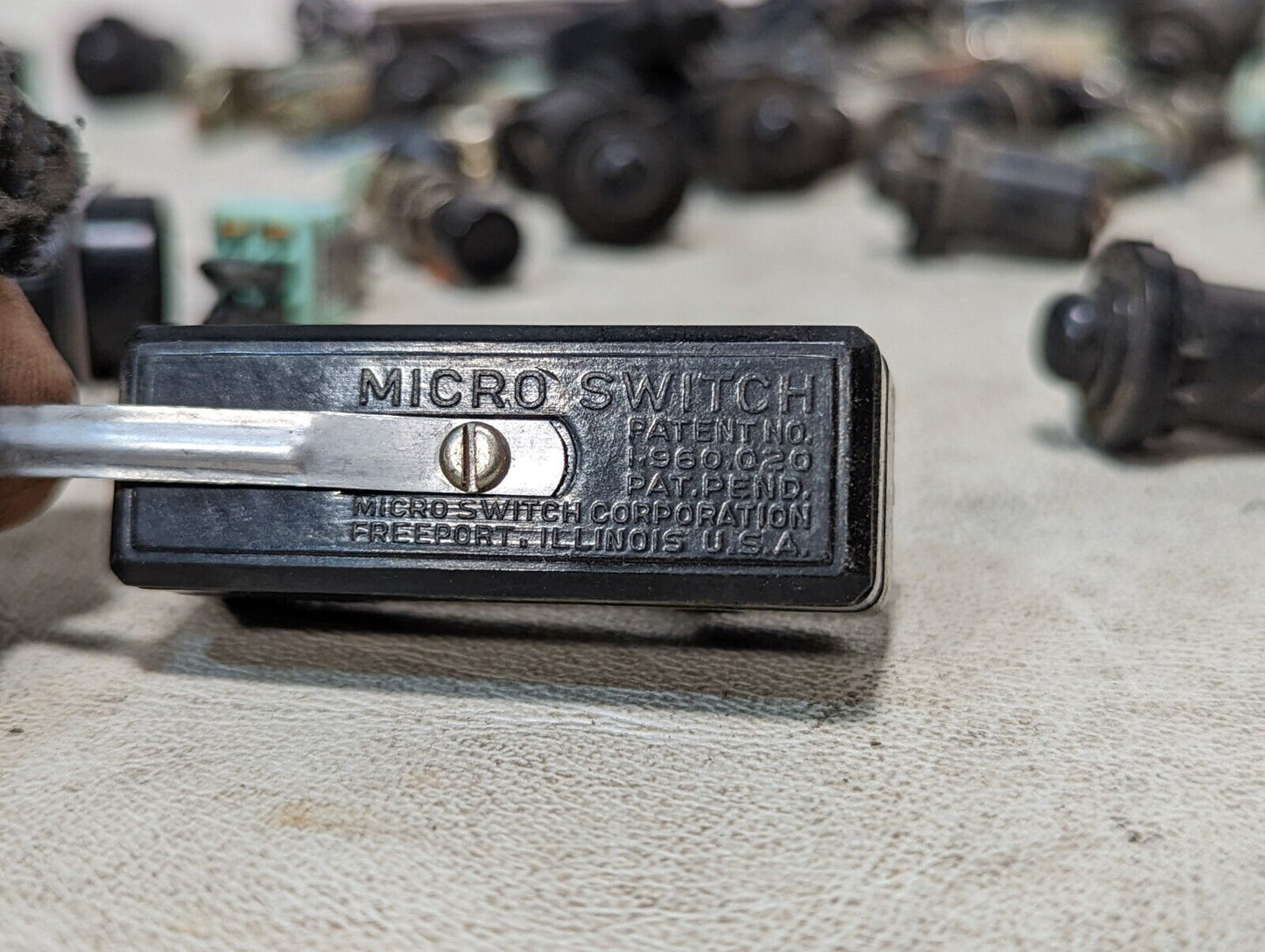 Lot of fuse holders, Micro Switch limit switches, small buttons, and relays
