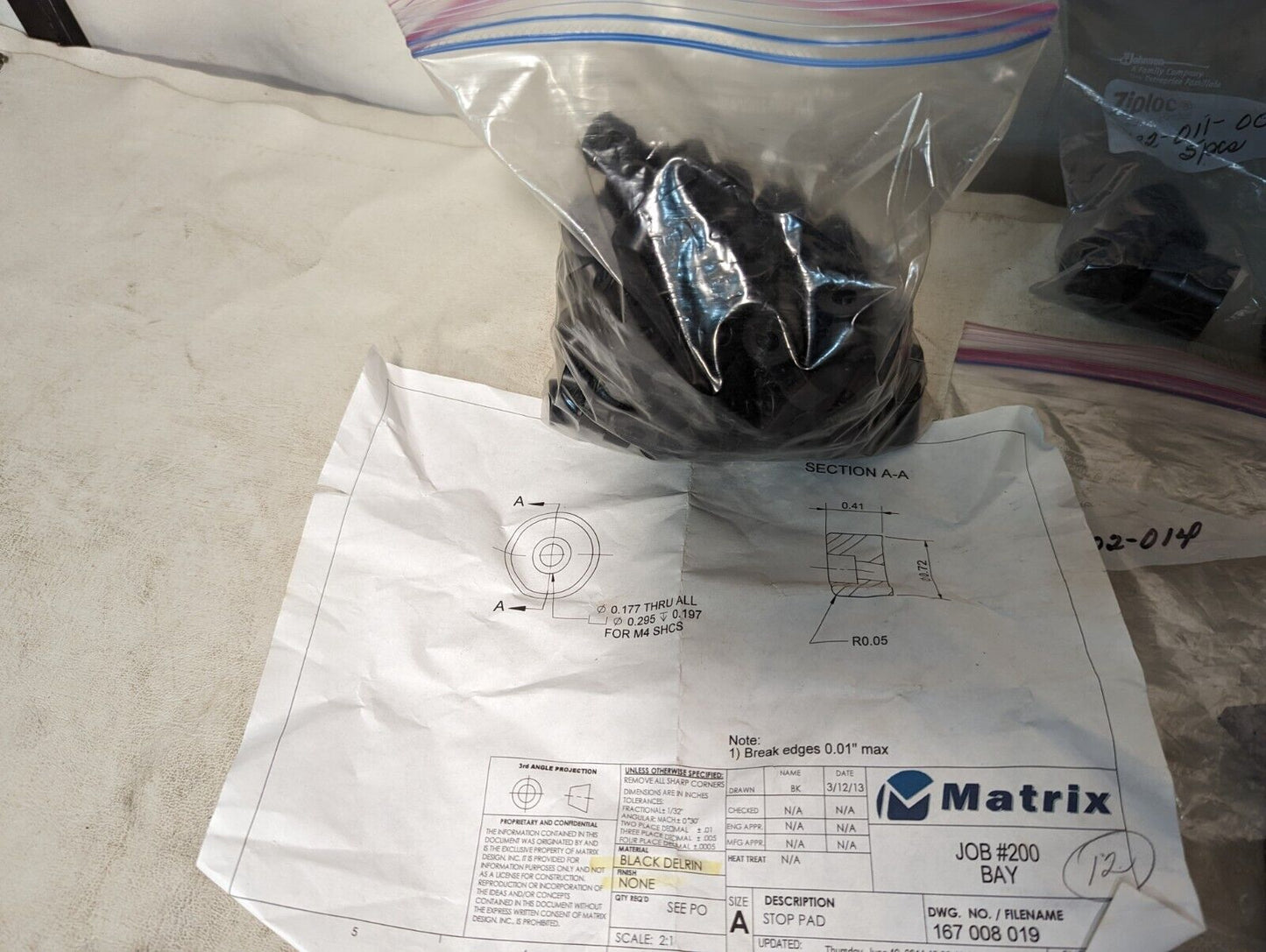 4.5+ pounds of black Delrin hardware as pictured