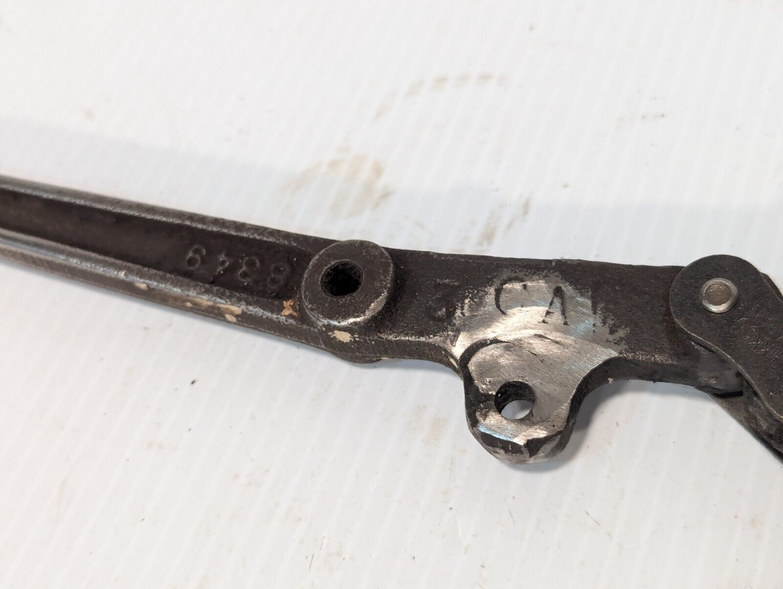 Steampunk 9.75 inch long steel handle with base, marked 8349, hinged