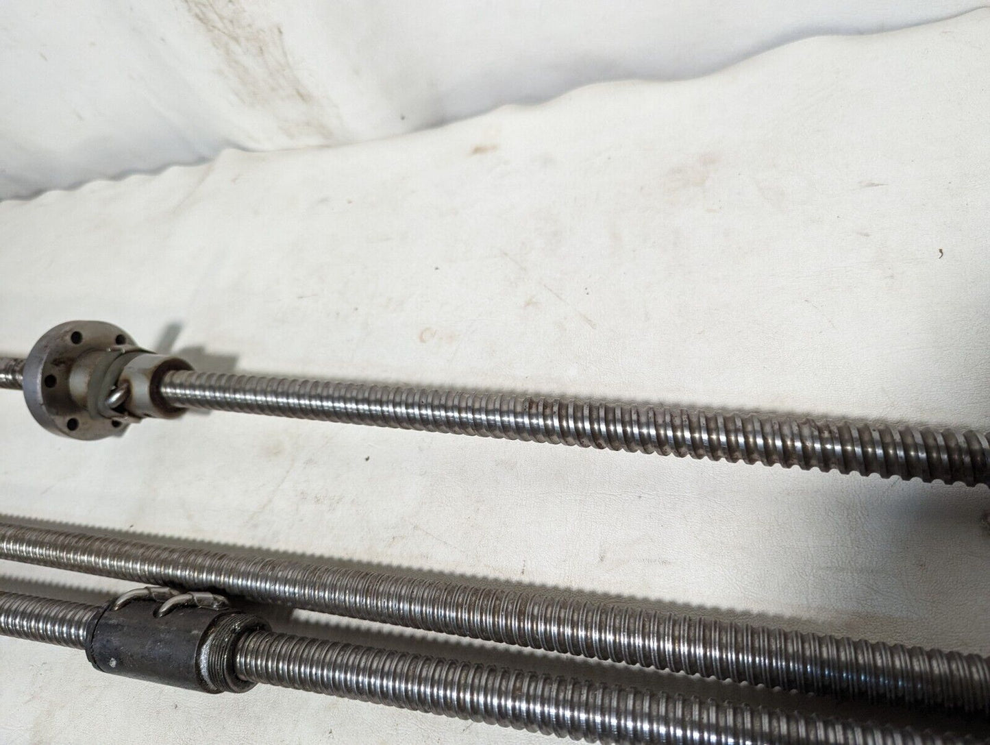 Lot of 4 feed screws, 3x 32 inches, 1x 36 inches long, plus some extras