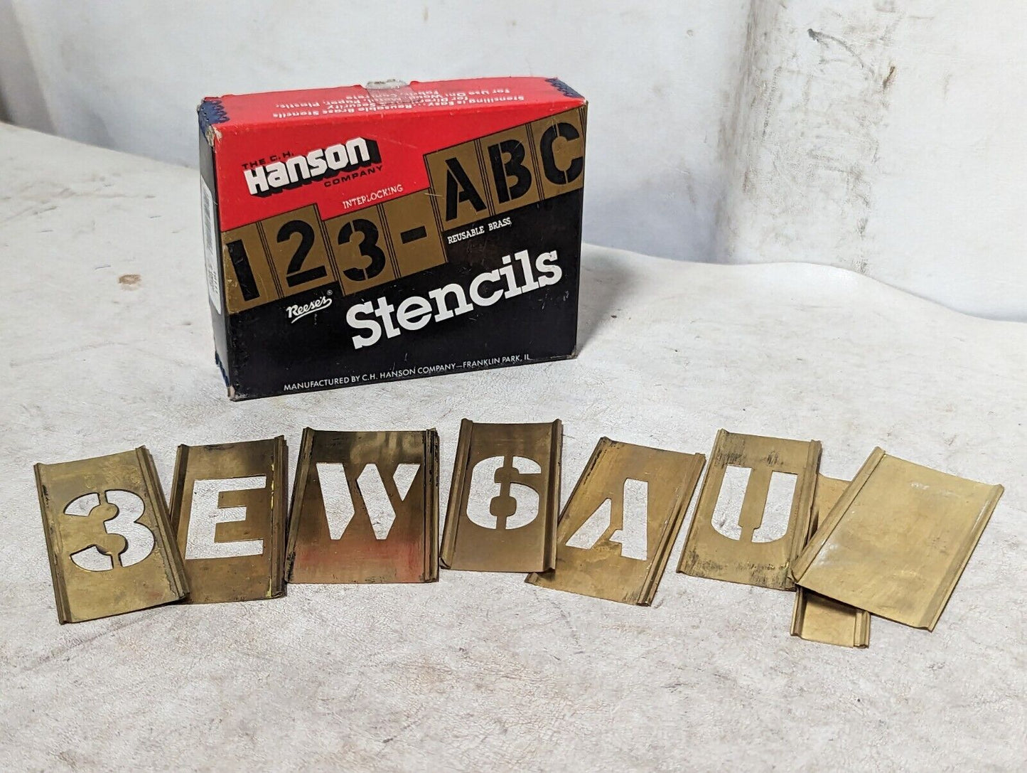 Hansen 10111 2-inch brass interlocking stencils, 77 pieces, 0-9, A-Z, punct. x2
