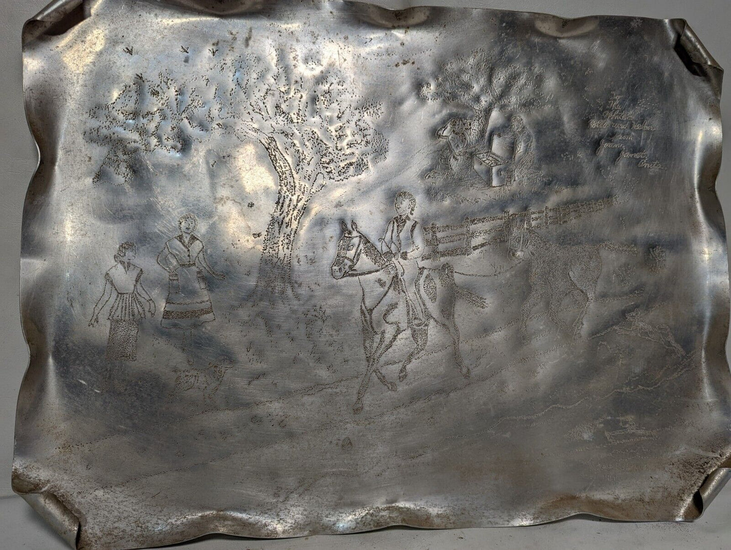 Handmade punched aluminum serving tray from 1951, horseback riding